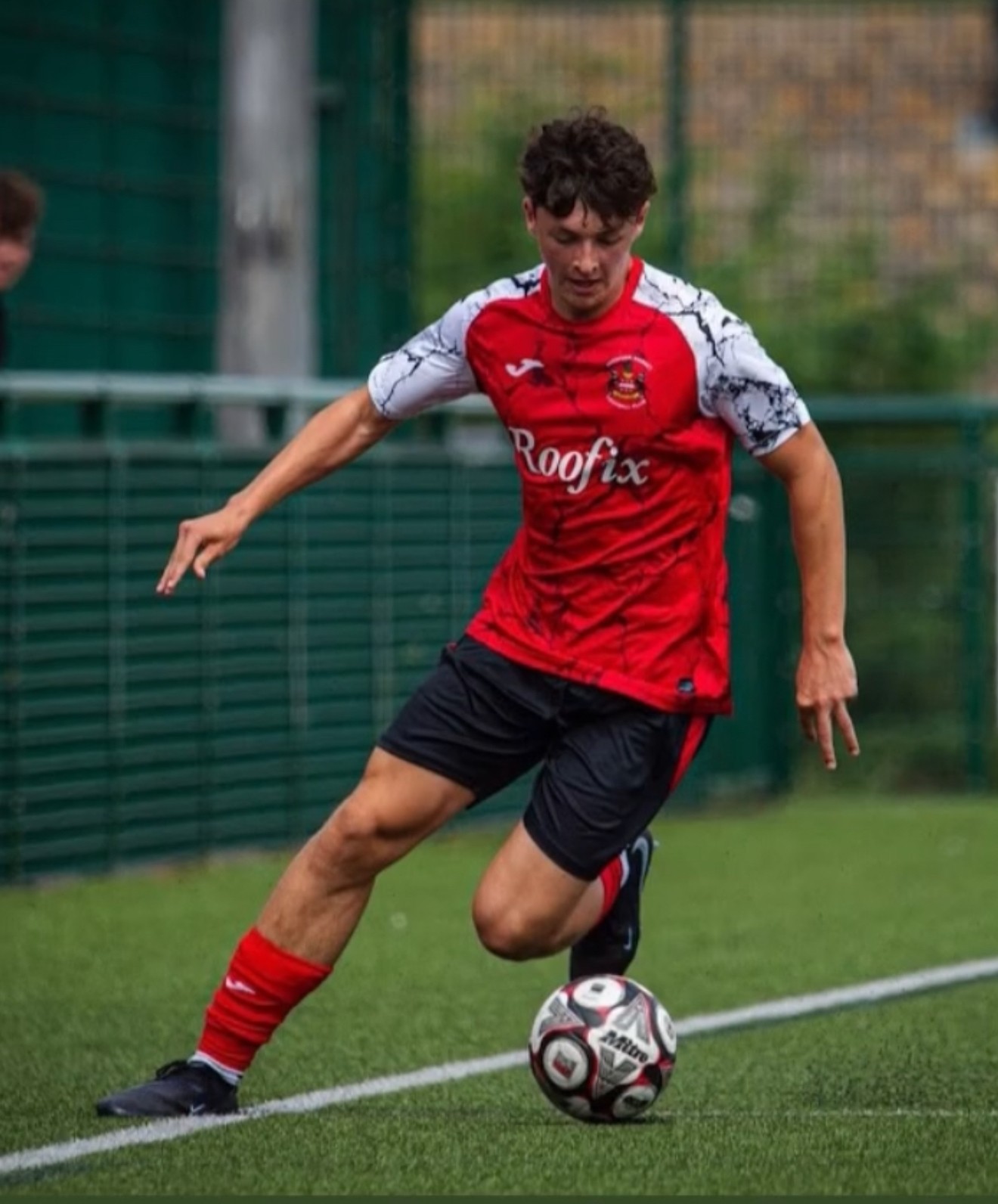 Harlyn Palmer, founder of AJH Technology, playing for Needham Market FC